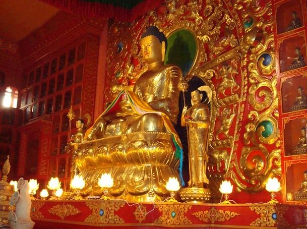 Golden Buddha statue inside Bokar Monastery near Mirik