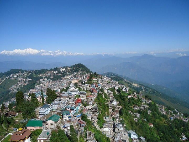Aerial view of Darjeeling town on its ridge with Himalayan peaks beyond
